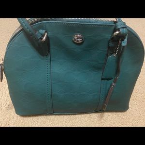 Teal coach purse with straps